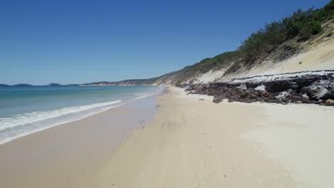 White-Sand-And-Turquoise-Ocean-At-Rainbow-Beach,-Queensland,-Australia---drone-shot