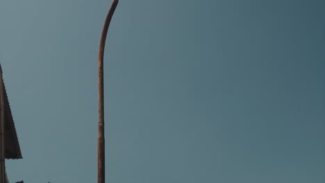 Old-rusty-light-pole.-Electricity,-street-lighting
