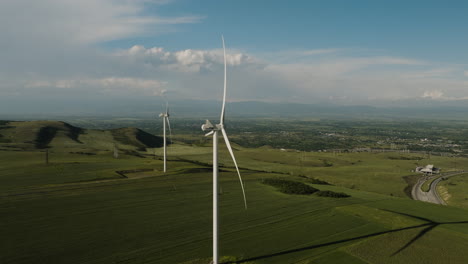 Wind-turbine-generator-farm-in-agricultural-landscape-in-Gori,-Georgia