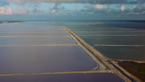 wide-aerial-of-salt-producing-lakes-at-Las-Coloradas-in-Mexico-during-dusk