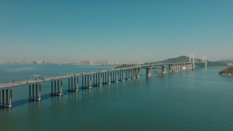 Car-traffic-on-Humen-bridge-over-Pearl-river-in-Zhujiangkou,-Guangdong-Province,-China,-aerial-view