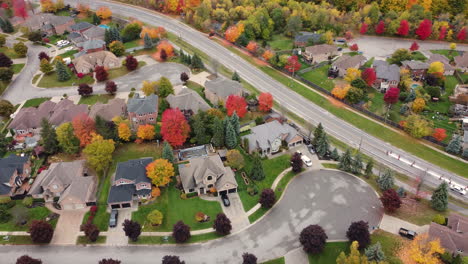 Aerial-of-a-beautiful-North-American-suburb-neighborhood-during-autumn-season