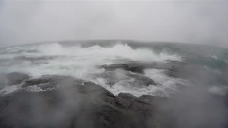 Slow-motion-shot-of-large-waves-crashing-on-the-rocky-shoreline-of-Lake-Superior