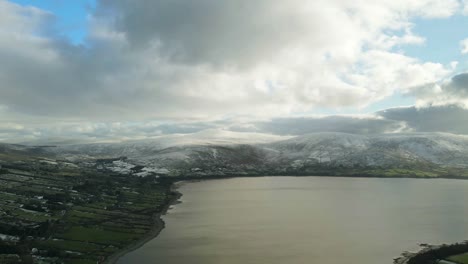 Timelapse-Of-Agricultural-Land-Partly-Covered-With-Snow-Near-Blessington-Lake,-Wicklow-County-In-Ireland