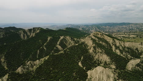 Ragged-arid-hills-with-vegetation,-Vashlovani-nature-reserve,-Georgia