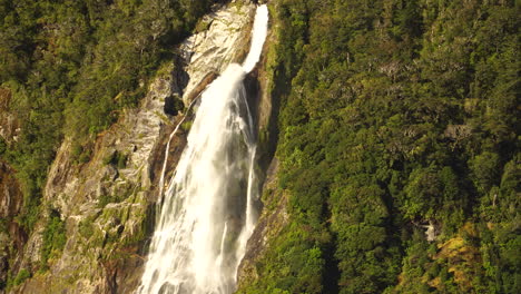 The-Bowen-Falls,-Lady-Bowen-Falls,-popular-tourist-attraction-at-Milford-Sound,-New-Zealand