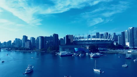 Vancouver-BC-Place-False-Creek-anchored-tour-boats-yachts-close-flyover-waterfront-vessels-stadium-plaza-of-nations-sunny-summer-city-skyline-modern-architecture-ideal-vacation-place-in-Canada