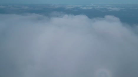 Rising-Drone-Shot-Through-Clouds-in-Spain,-Breathtaking-Aerial-View