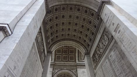 Looking-Up-Into-The-Arc-de-Triomphe-Monument-In-Paris,-France