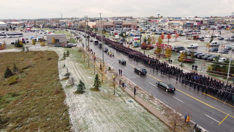 Aerial-view-of-procession-route-for-the-funeral-of-fallen-police-officer-in-Barrie,-Canada