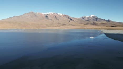 Laguna-Route-Bolivia,-Blue-Water-Lagoon,-Altitude-Mountains-of-Atacama-Desert,-Panoramic-Landscape-of-Surreal-Beauty,-Travel-and-Tourism-Latin-America