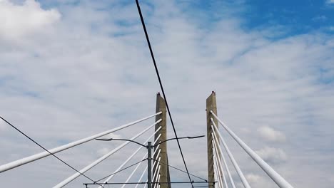 HD-Nice-shot-looking-up-going-across-Tilikum-Crossing-Bridge-in-Portland-Oregon-with-mostly-cloudy-sky-take-seven