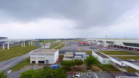 Aerial-shot-of-Kuala-Lumpur-airport-in-the-foggy-day