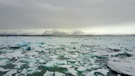 Iceland-Jökulsárlón-iceberg-floating-in-sea,-glacier-melting