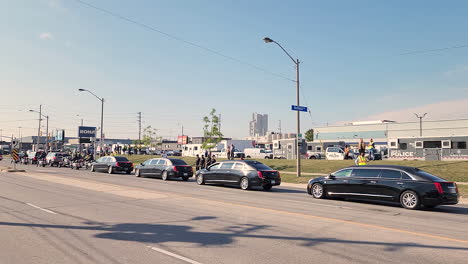 21-September-2022---Row-Of-Luxury-Black-Limousines-Parked-On-Road-For-Funeral-Service-For-Police-Officer-Andrew-Hong-At-The-Toronto-Police-Services