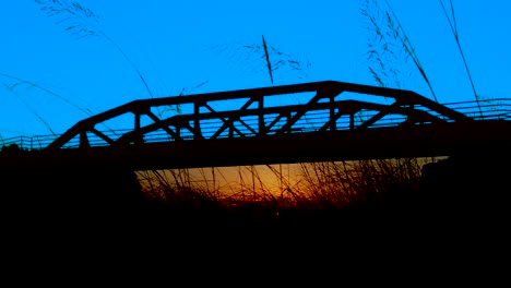 HD-The-Colony,-The-Tribute,-American-Bridge-boom-at-sunrise