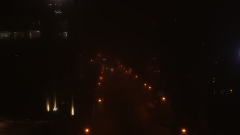 Cinematic,-city-under-fog-aerial-drone-footage-of-Cluj-Napoca-city-at-spooky-night