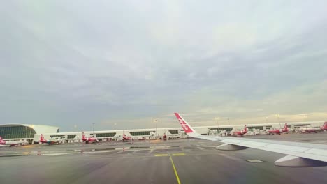 View-from-window-of-airplane-taking-off-in-Kuala-Lumpur-airport-in-December