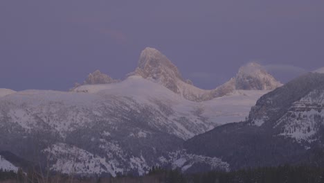 Panning-shot-to-high-mountain-peaks-at-sunset-in-western-Wyoming