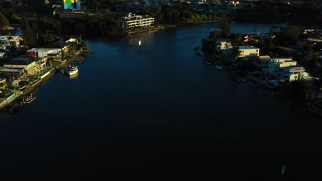 One-of-the-Main-Canals-overlooking-luxury-homes,-Gold-Coast-at-sunset