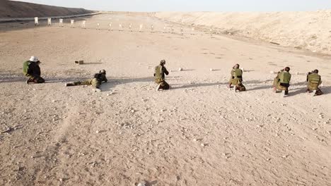 Rows-of-First-Army-soldiers-practicing-target-shooting-in-the-desert