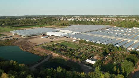 Aerial,-agricultural-industrial-area-with-rows-of-greenhouse-nurseries-growing-food