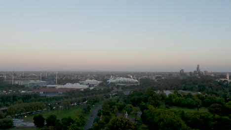 Evening-drone-approach-toward-Melbourne-Sport-Precinct-with-stunning-gradient-colours-in-the-sky-above