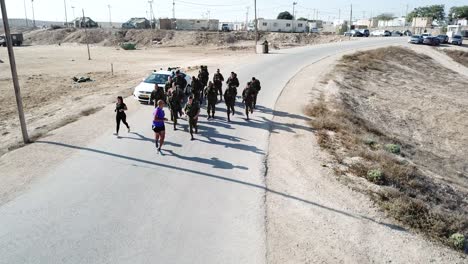 IDF-Soldier-jogging-hand-in-hand-during-routine-physical-training