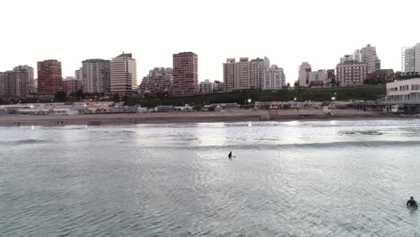 Surfing-in-the-city-of-Mar-del-Plata-during-sunrise