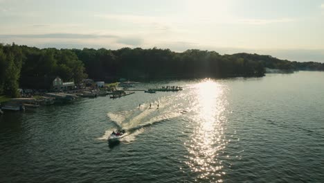 Aerial-of-water-skiers-at-a-water-ski-show-on-Balsam-Lake,-Wisconsin