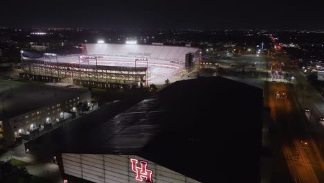 Aerial-view-towards-the-TDECU-Stadium,-nighttime-in-Houston,-Texas,-USA