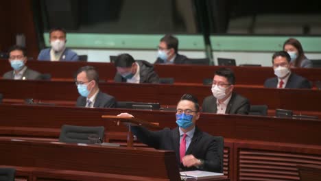 A-lawmaker-speaks-during-a-meeting-at-the-Legislative-Council's-main-chamber-in-Hong-Kong