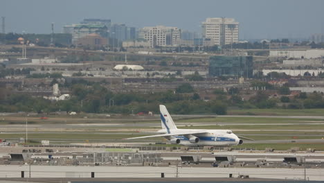 Russian-Antanov-124-cargo-plane-taxiing-in-Toronto-airport,-distance-view
