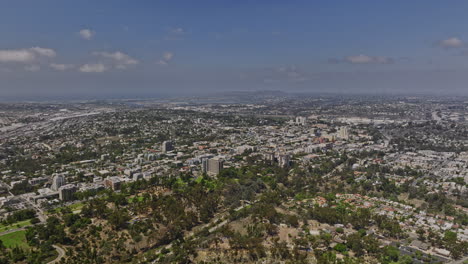 San-Diego-California-Aerial-v76-panoramic-view-above-balboa-park-capturing-across-hilly-neighborhoods,-airport,-downtown-cityscape-and-coronado-north-island---Shot-with-Mavic-3-Cine---September-2022
