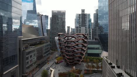 Establishing-aerial-of-Vessel-structure,-Hudson-Yards,-closed-because-of-suicides,-Manhattan-New-York-during-the-day