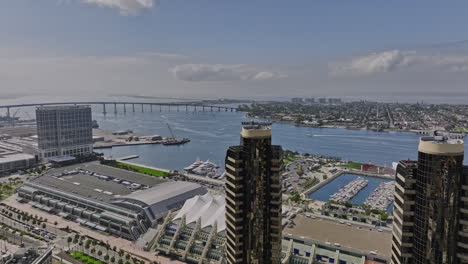 San-Diego-California-Aerial-v46-panoramic-panning-view-above-harbor-drive-capturing-coronado-island,-embarcadero-marina-park-and-bayside-downtown-cityscape---Shot-with-Mavic-3-Cine---September-2022
