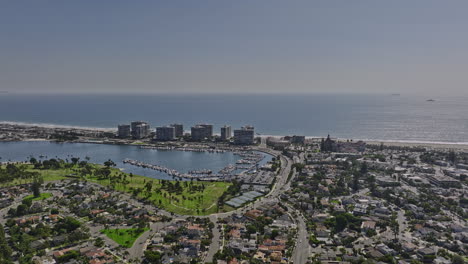 San-Diego-California-Aerial-v60-flyover-coronado-neighborhood-capturing-glorietta-bay-marina-and-condominium-complex-with-pacific-ocean-views-on-a-sunny-day---Shot-with-Mavic-3-Cine---September-2022