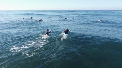 Surfers-paddling-out-to-the-break