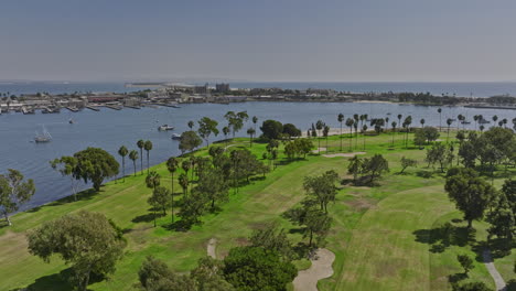 San-Diego-California-Aerial-v58-cinematic-drone-flyover-coronado-golf-course-overlooking-at-nab-swimming-pool-on-silver-strand-across-glorietta-bay-in-summer---Shot-with-Mavic-3-Cine---September-2022