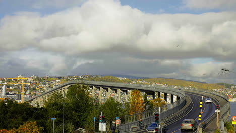 Cars-Driving-Through-Tromso-Bridge,-Cantilever-Road-Bridge-In-Tromso,-Troms-og-Finnmark,-Norway