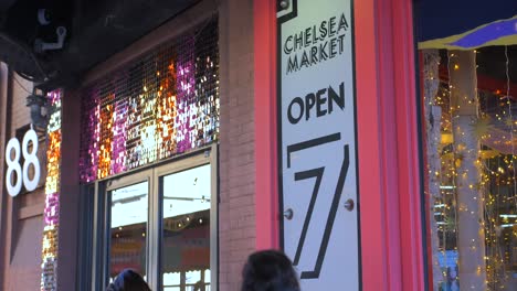 Entrance-Sign-Of-Chelsea-Market-With-Glittering-Decorations-In-New-York-City,-New-York