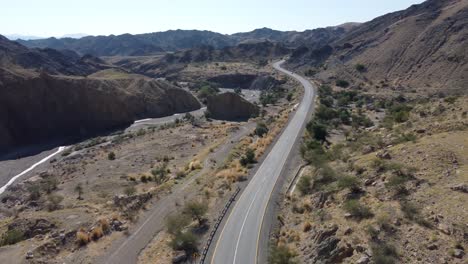 Aerial-View-Of-Truck-Driving-Along-Highway-N-25-In-Baluchistan