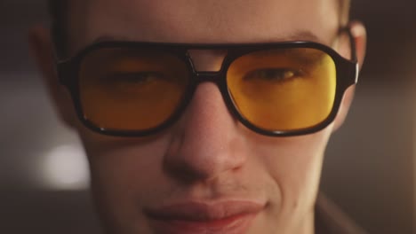 Extreme-Close-up-Of-A-Trendy-Guy-Wearing-Fancy-Yellow-Eyeglasses