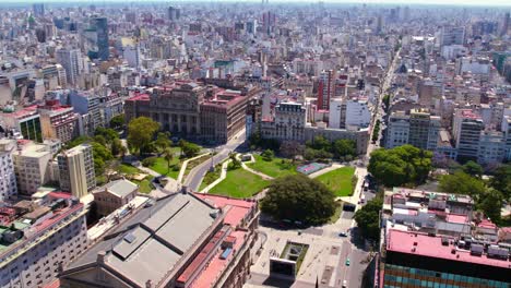 Aerial-establishing-shot-of-Lavalle-Square-and-the-National-Palace-of-Justice,-Buenos-Aires