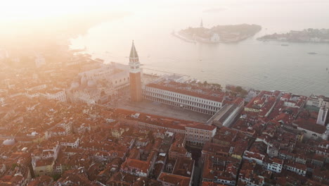 Saint-Mark's-Square-Or-Piazza-San-Marco-At-Sunrise-In-Venice,-Italy---aerial-drone-shot