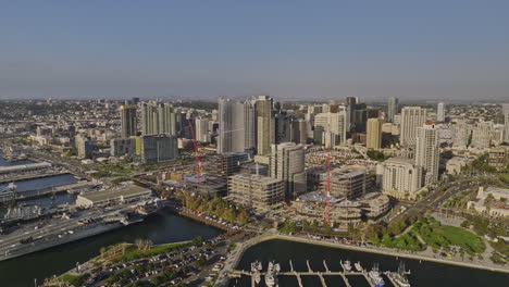 San-Diego-California-Aerial-v90-flyover-bay-piers-capturing-maritime-museum,-embarcadero-marina-and-downtown-cityscape-of-waterfront-condominiums-and-hotels---Shot-with-Mavic-3-Cine---September-2022