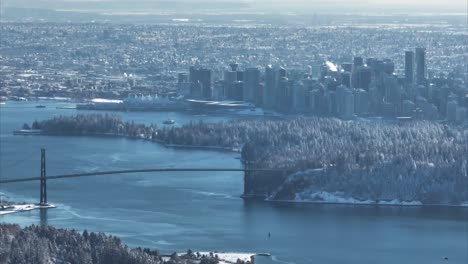 Telephoto-Drone-Aerial-Shot-of-Lions-Gate-Bridge-in-Winter-Snow,-Vancouver-Canada