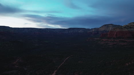Aerial-Panorama-Of-Forested-Nature-Landscape-At-Sedona-Red-Rock-In-Arizona-During-Dusk