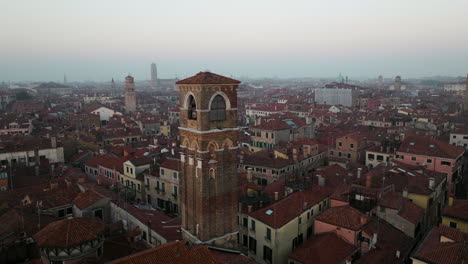Venice-Cityscape-During-Sunrise-In-Italy---aerial-drone-shot