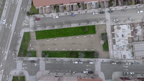 Bird-s-Eye-Shot-Of-Street-In-Modern-Residential-Area-Decorated-With-Green-Spaces